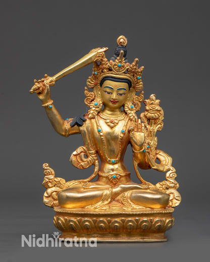 Front view Bodhisattva Manjushri Statue with gold-gilded face and sword of wisdom
