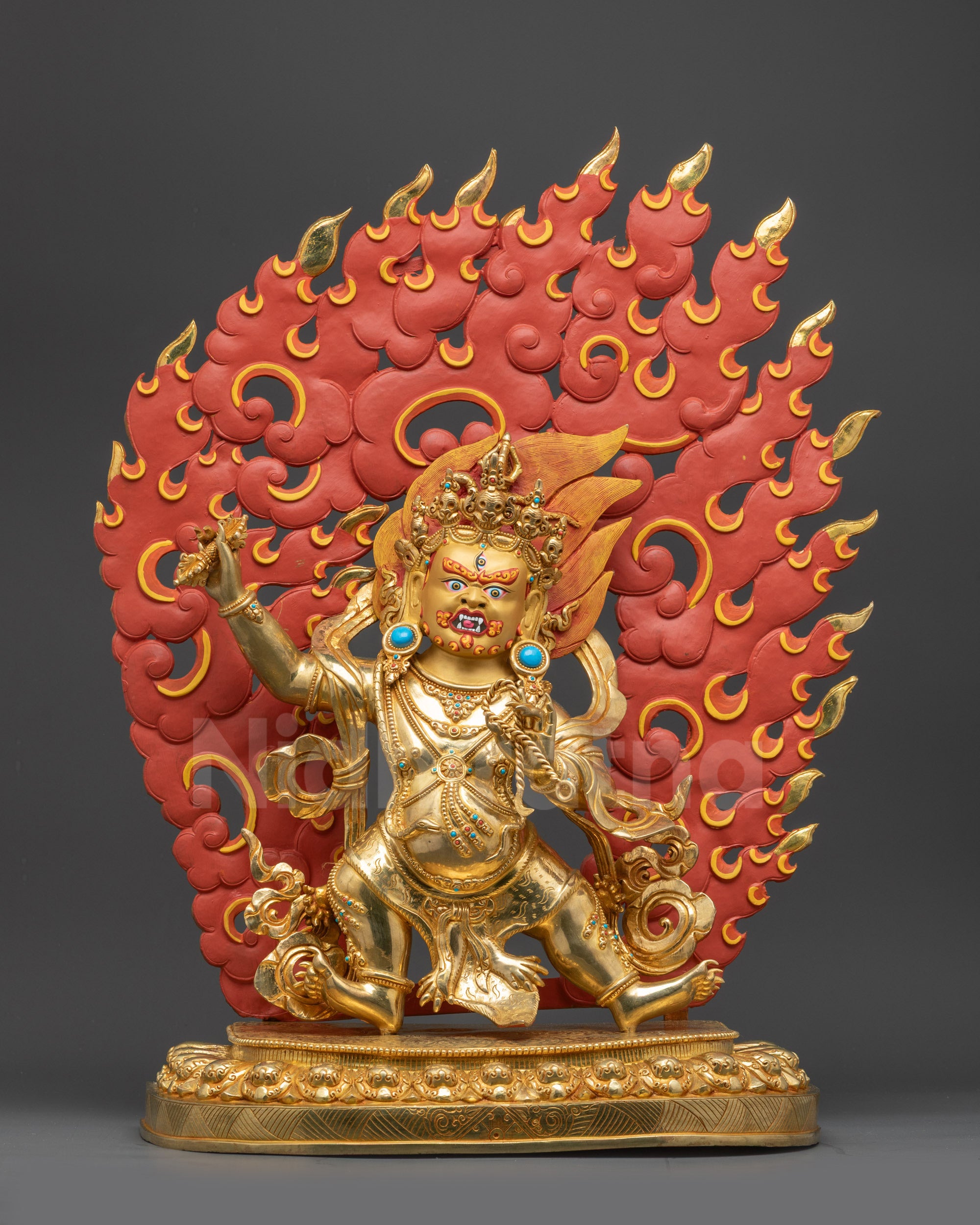 Front view Bodhisattva Vajrapani statue with gold fire-gilded robe and lotus pedestal