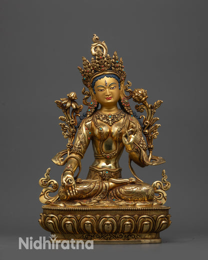 Front view Brilliant White Tara Statue with gold-gilded face and lotus seat
