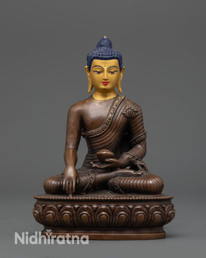 Tibetan copper with gold face, earth-touching mudra
