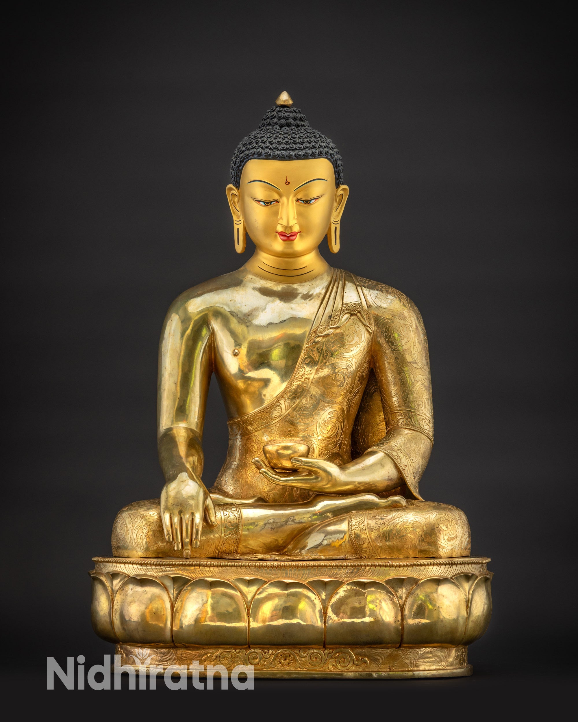 Front view Buddha Shakyamuni statue from Nepal gold gilded for home and altar decor