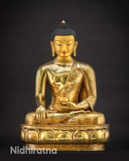 Front view Buddha Shakyamuni statue from Nepal gold gilded for home and altar decor