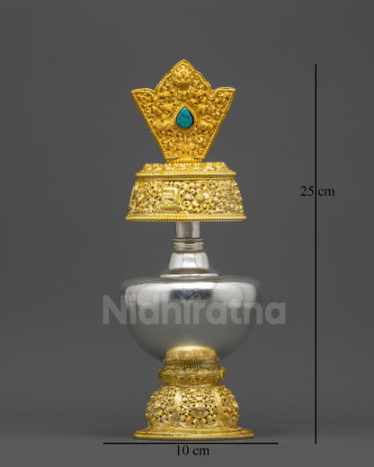 Front view Che Bhumbha ritual vessel with silver and gold plating on floral base
