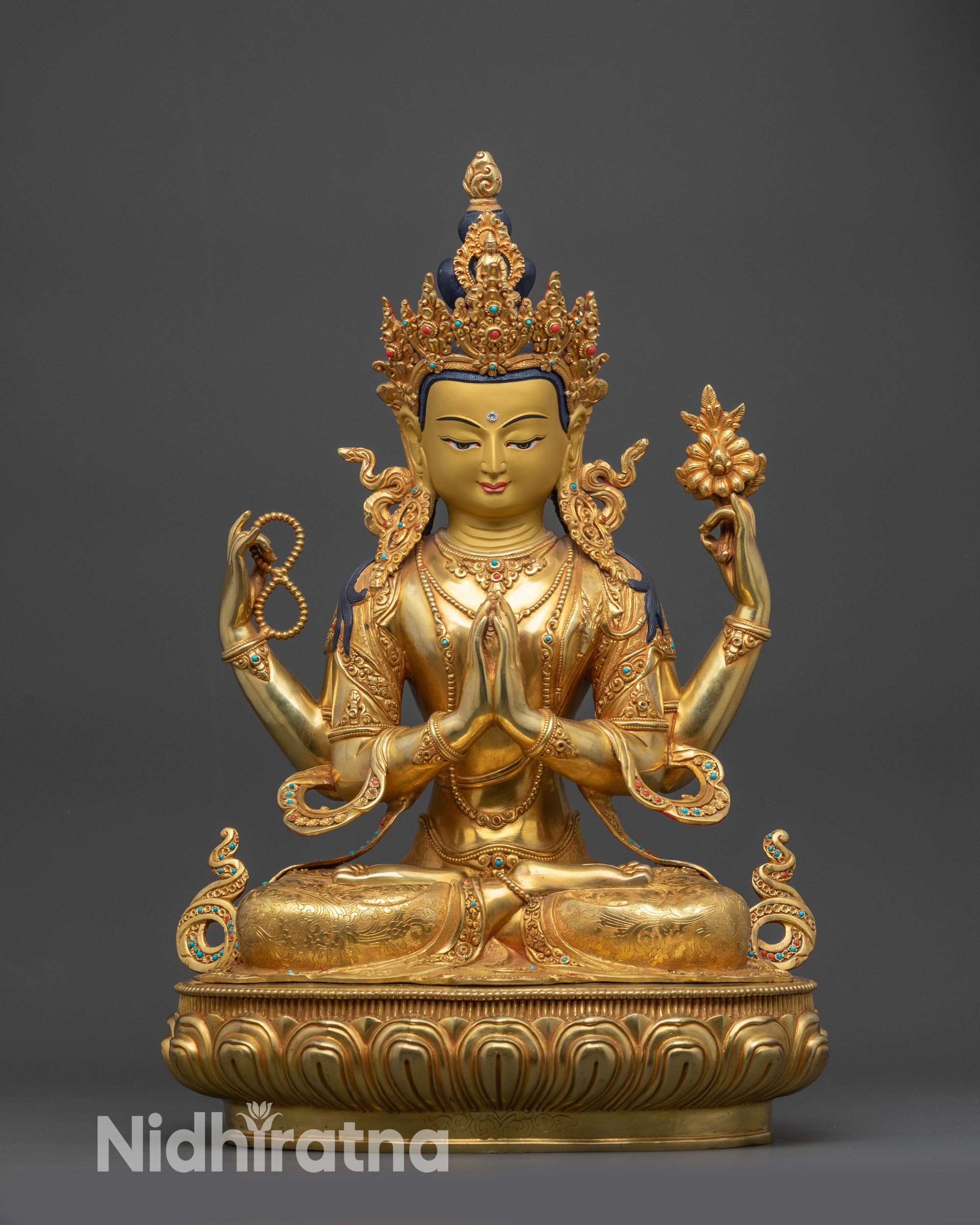 Front view Chenrezig Statue with gold-gilded face and lotus throne from Nepal
