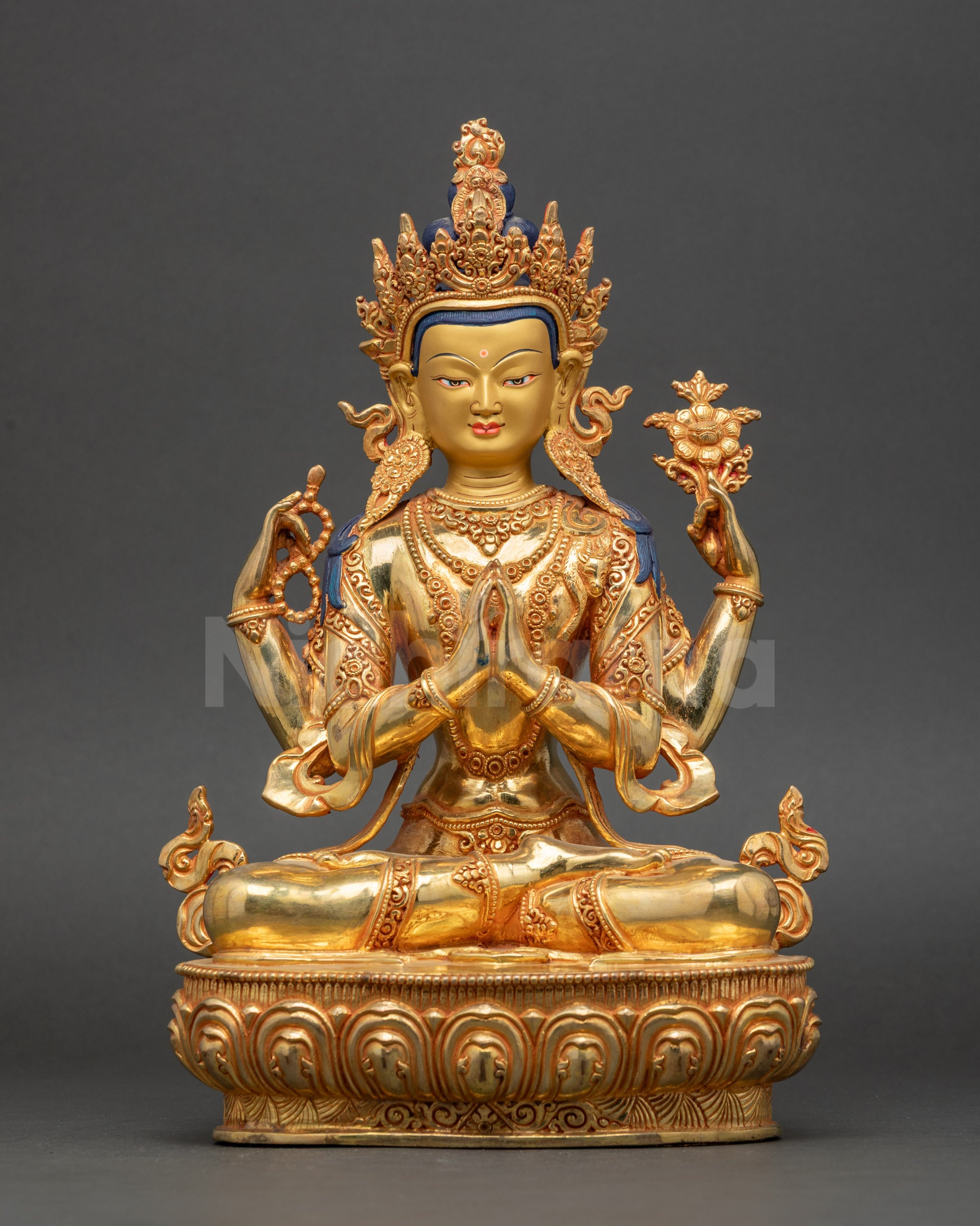 Front view Chenrezig statue handcrafted in Nepal copper with gold-gilded finish