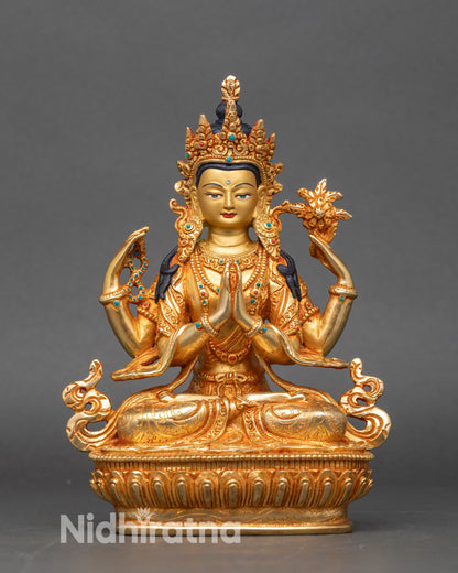 Front view Chenrezig statue handmade in Nepal with gold finish and lotus throne