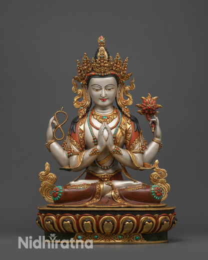 Front view Chenrezig statue with gold-plated robe and lotus seat
