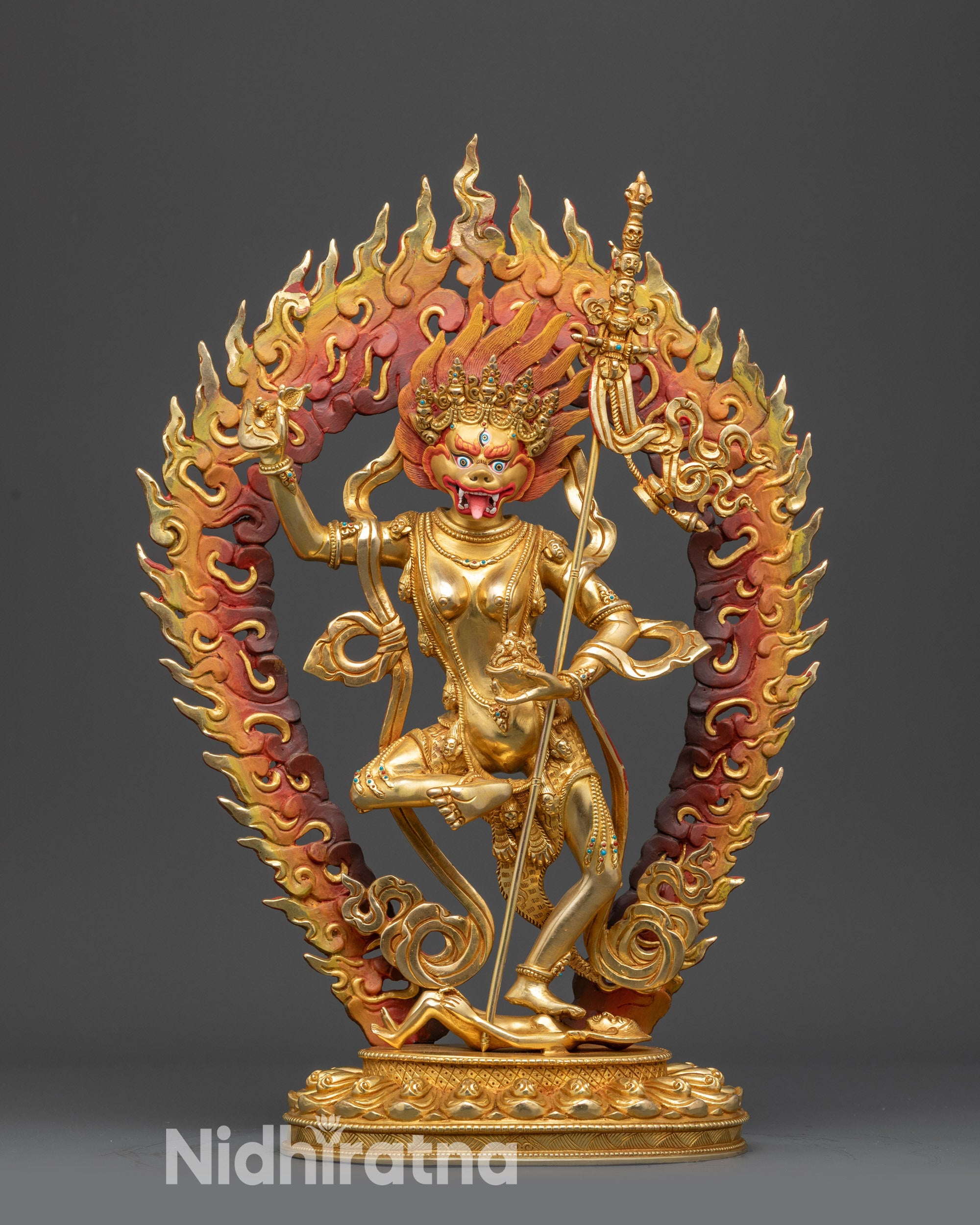 Front view Dakini Simha Mukha Statue with gold-gilded face and fierce expression
