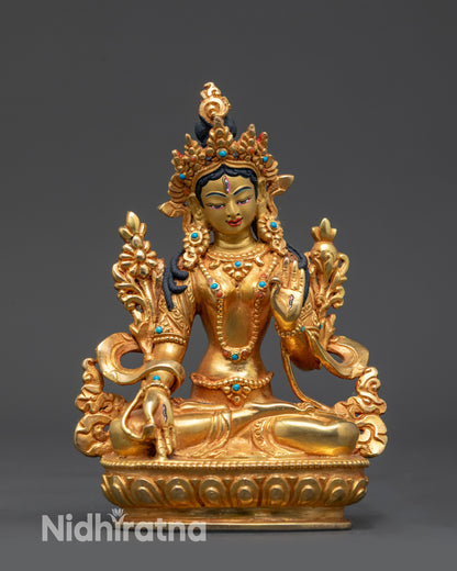 Front view Divine Sapta Lochani White Tara statue with gold-gilded face and seven eyes
