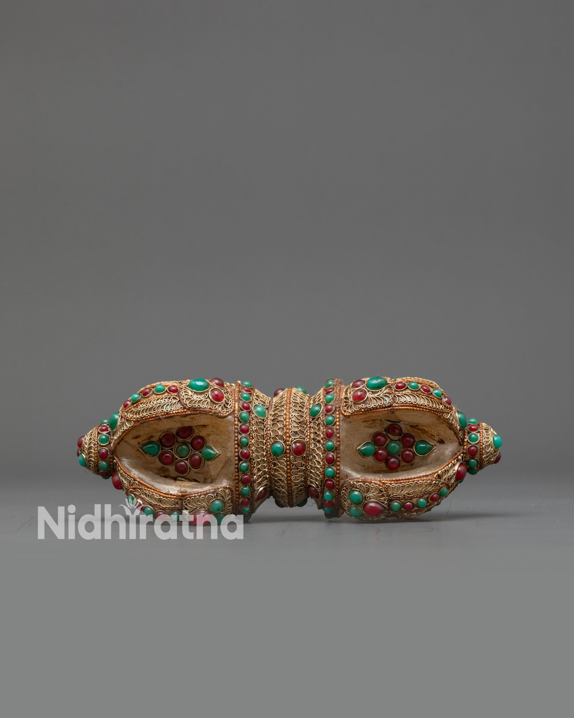 Front view Double-Ended Crystal Dorje Vajra with turquoise, ruby & emerald stones