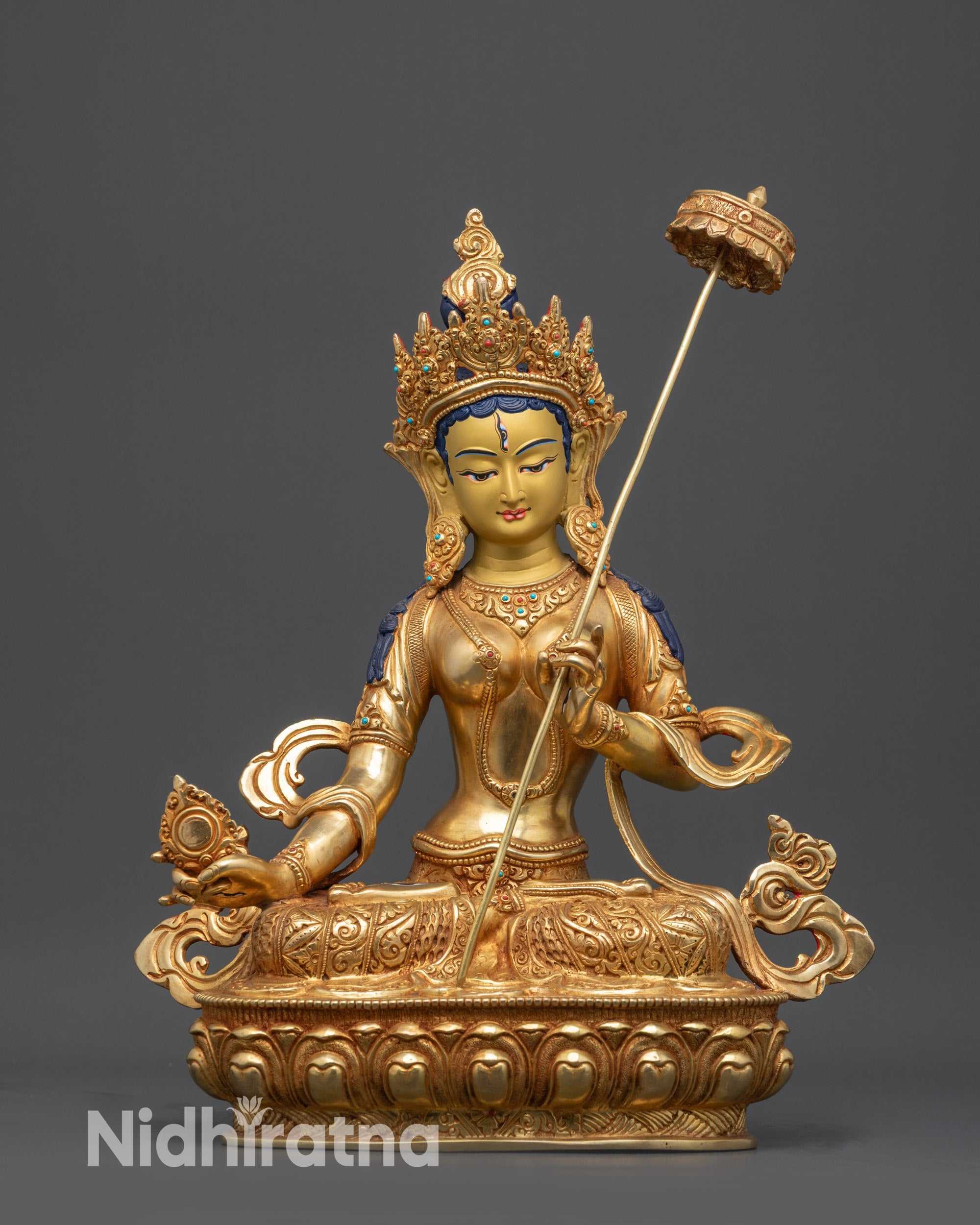 Front view Dukar White Parasol Bodhisattva statue with gold-gilded face and parasol
