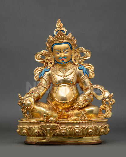 Front view Dzambhala God of Wealth statue on lotus seat with gold-gilded face