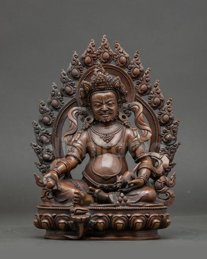 Front view Dzambhala statue seated on lotus, fully oxidized handmade Nepalese sculpture
