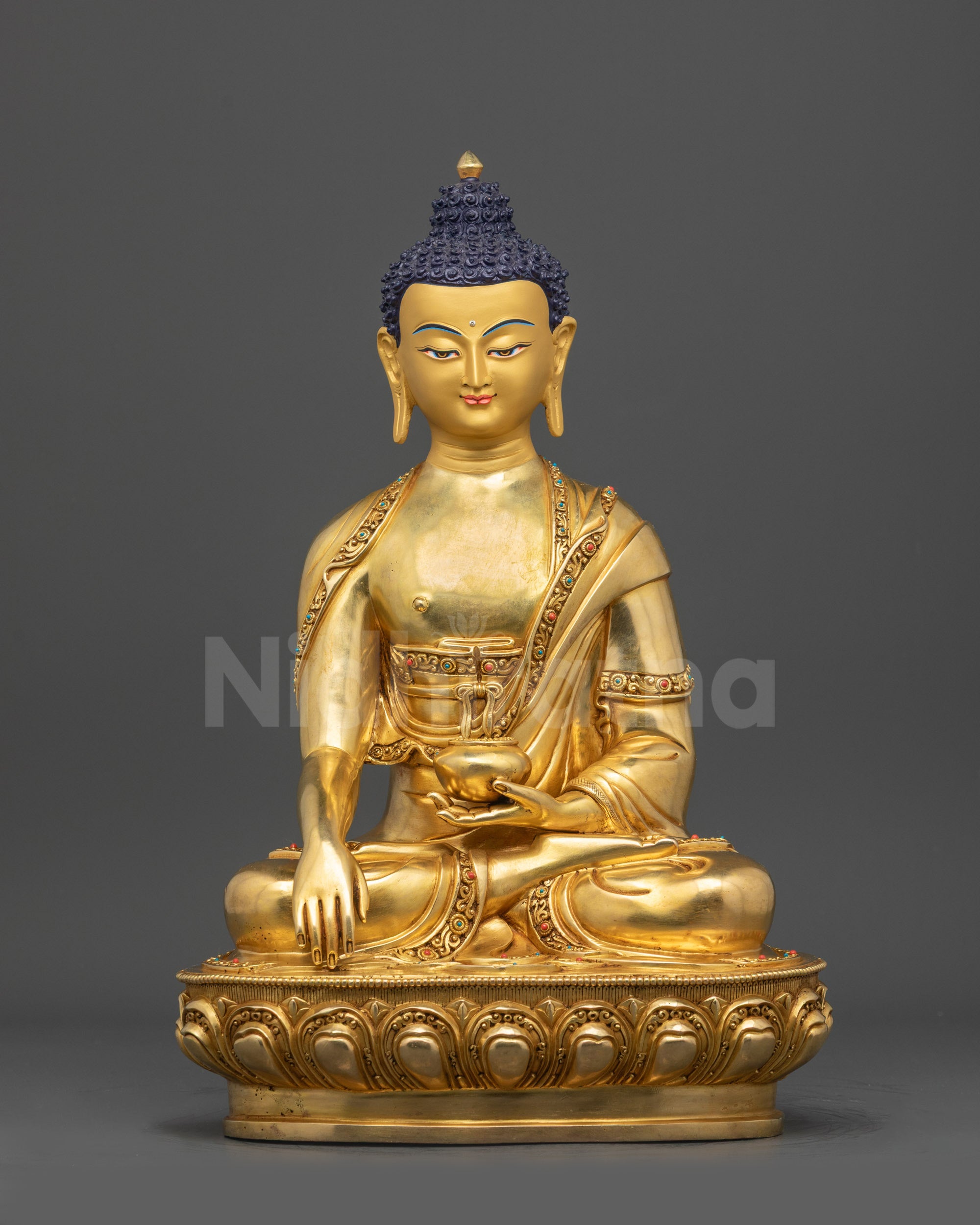 Front view Enlightened Shaka Buddha Statue with gold-gilded face and lotus base