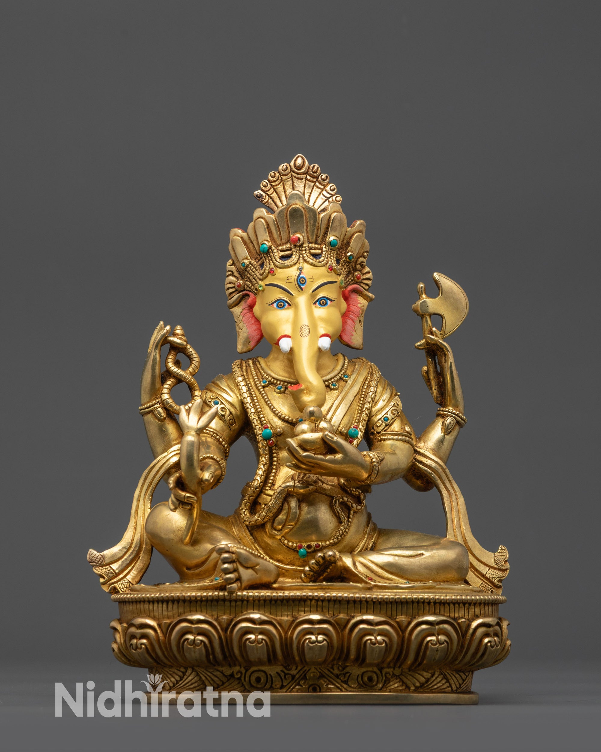 Front view Four-Armed Ganesha Statue with jeweled crown and lotus seat