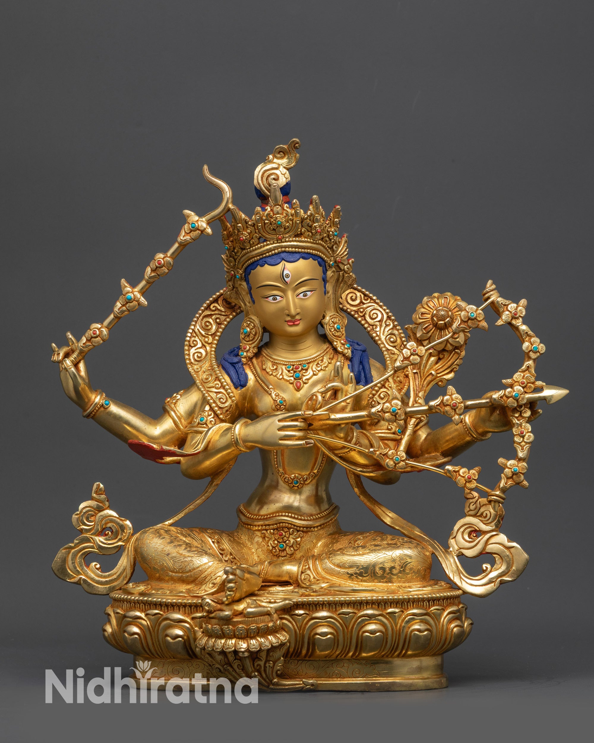 Front view Gold-Gilded Kurukulla Statue on lotus seat with wrathful expression
