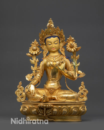 Front view Green Tara Goddess statue with gold-gilded face and lotus seat
