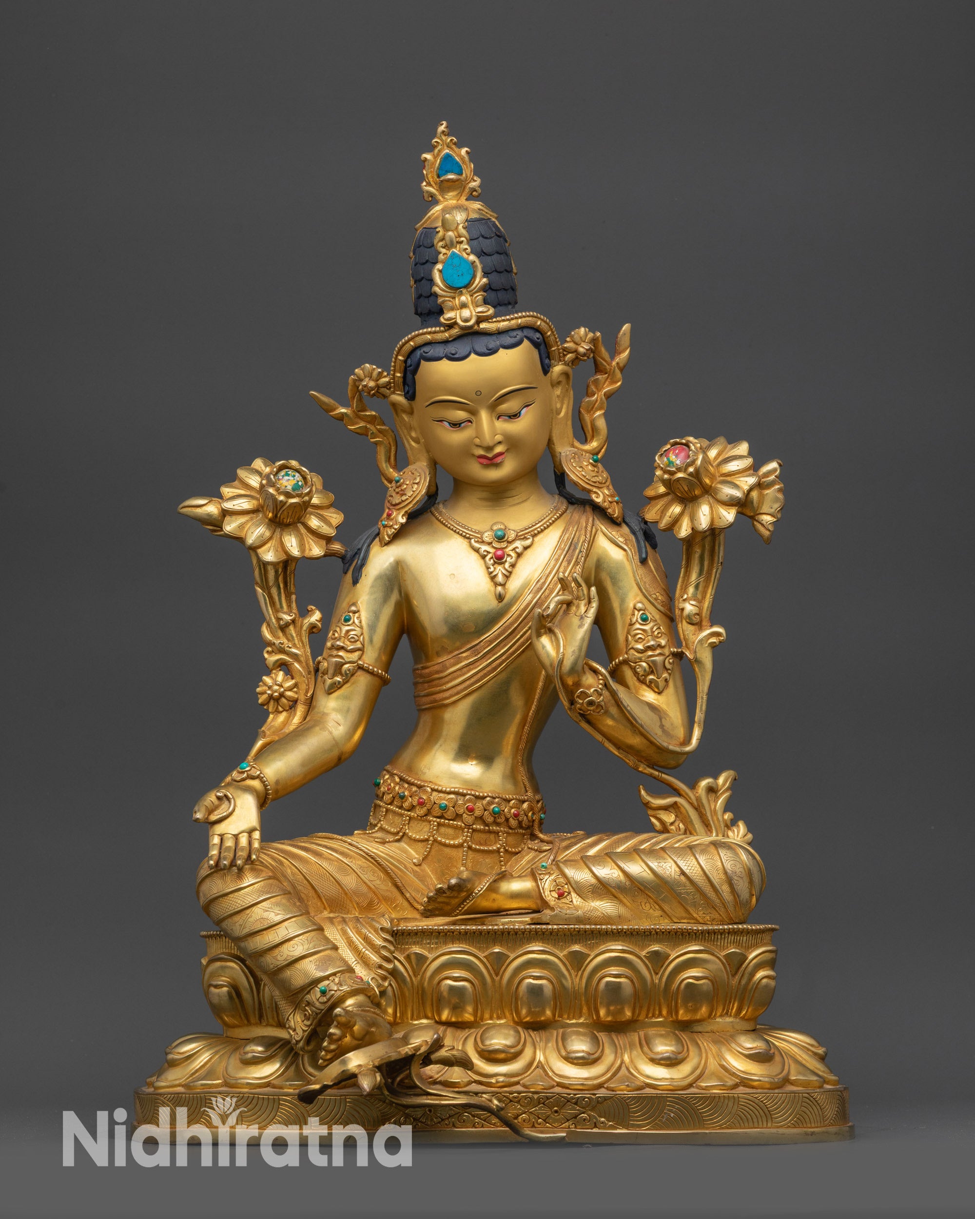 Front view Green Tara Statue Nepalese Buddhist sculpture with gold-gilded face
