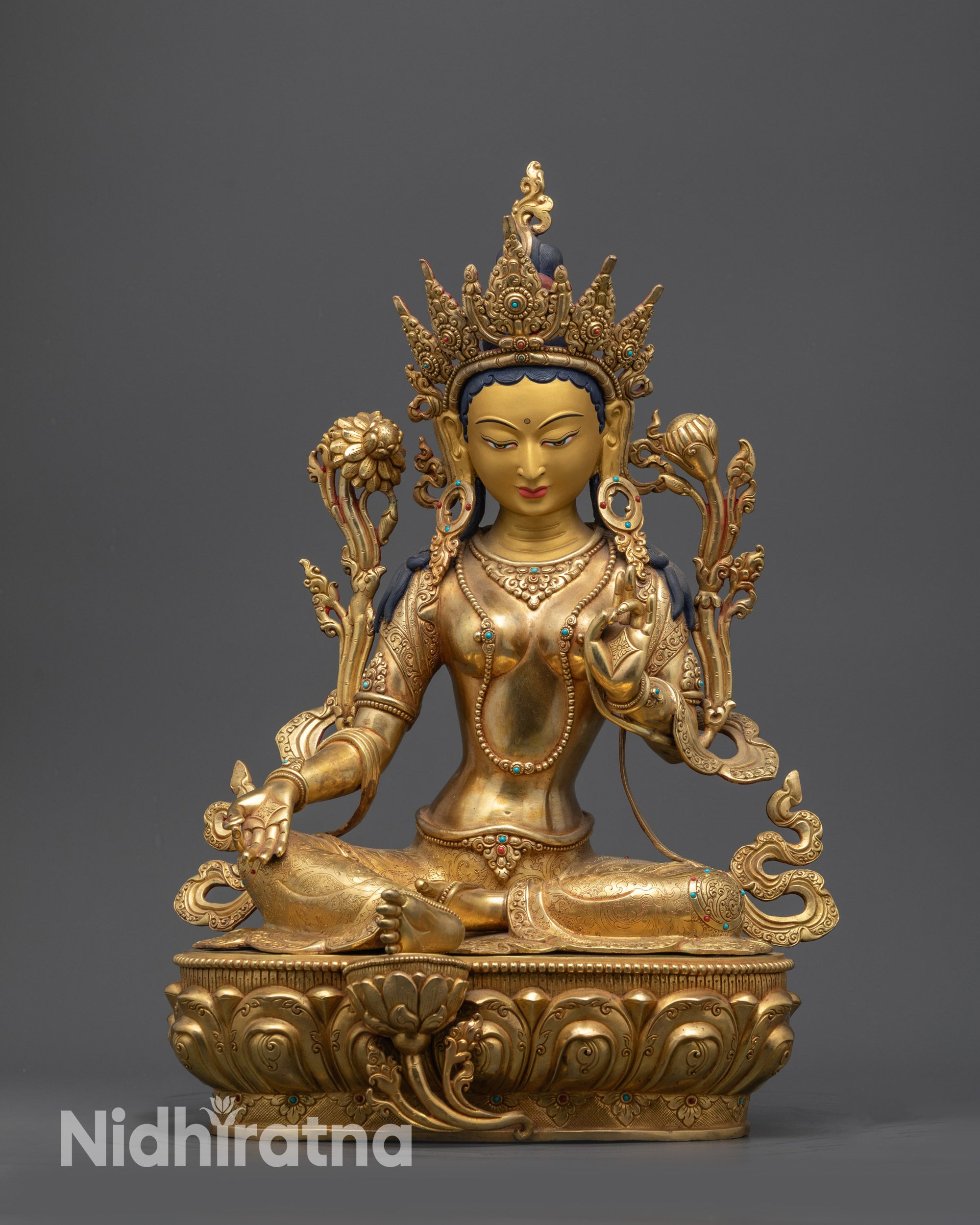 Front view Green Tara Statue with lotus seat and Utpala flower, gold-gilded face