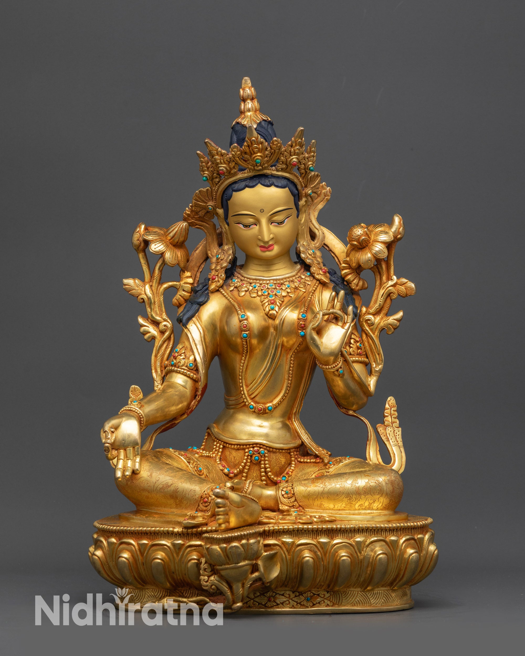 Front view Green Tara statue seated on lotus with 24K gold fire-gilded details
