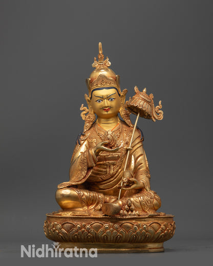 Front view Guru Norlha statue 24K gold gilded with lotus seat and victory banner