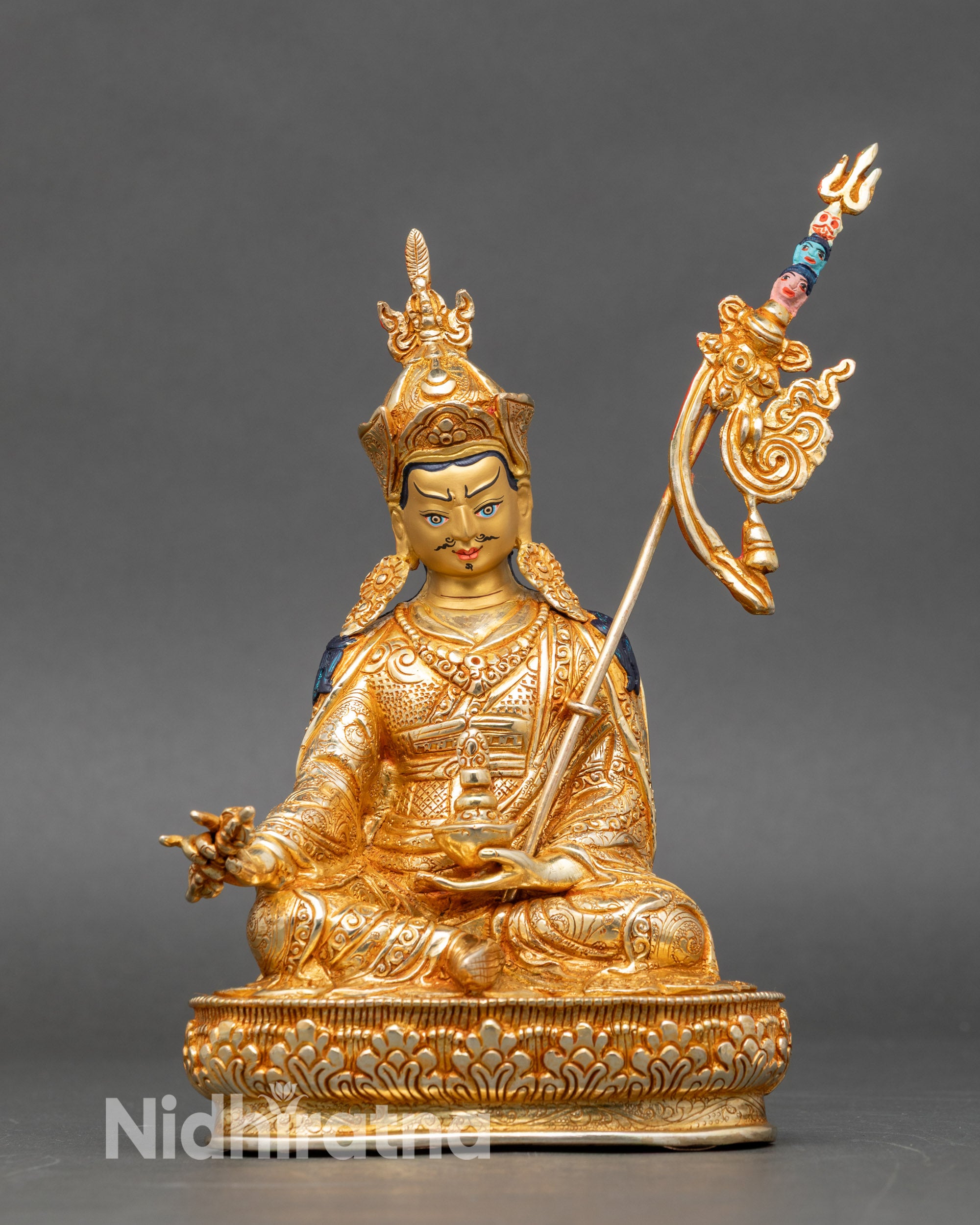 Front view Guru Padmasambhava statue in Nepalese copper with gold fire-gilded face
