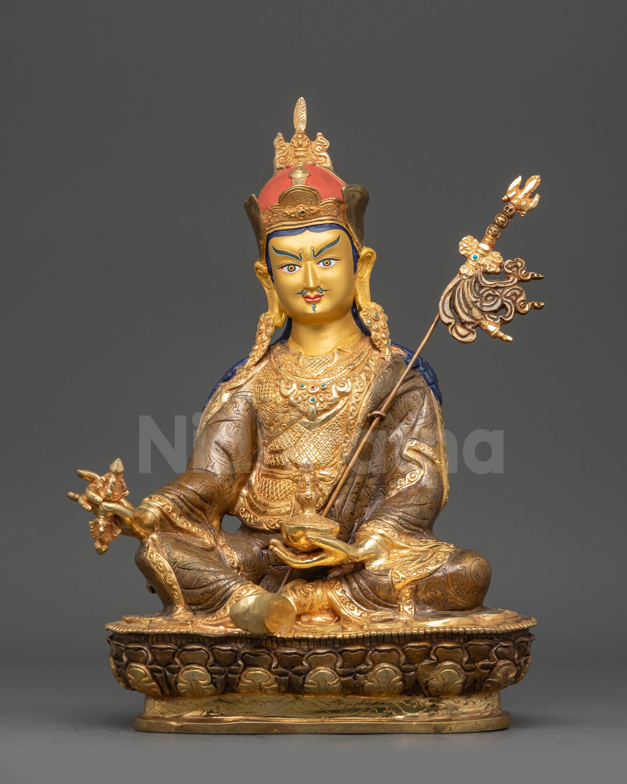Front view Guru Padmasambhava statue on half-gold fire-gilded base lotus throne
