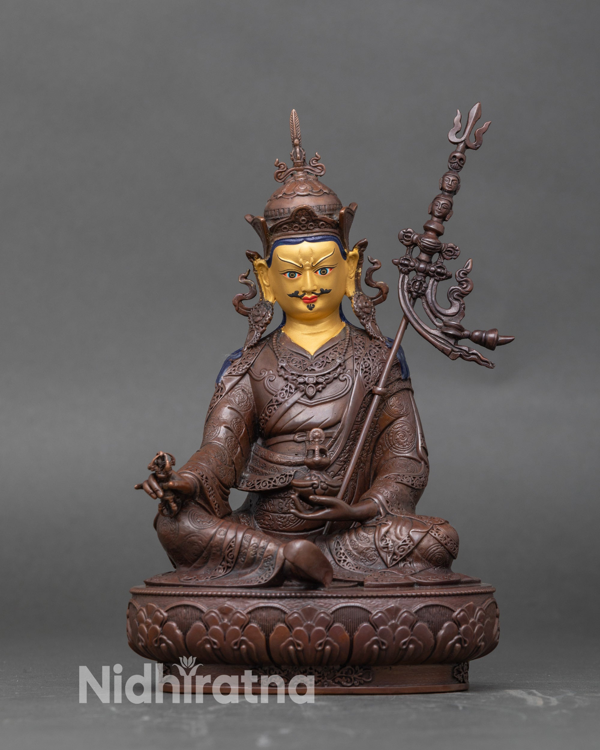 Front view Guru Rinpoche statue copper with oxidized finish and 24K gold-gilded face