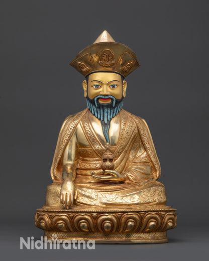 Front view Guru Shapdum statue on lotus seat with gold-gilded face and detailed robes
