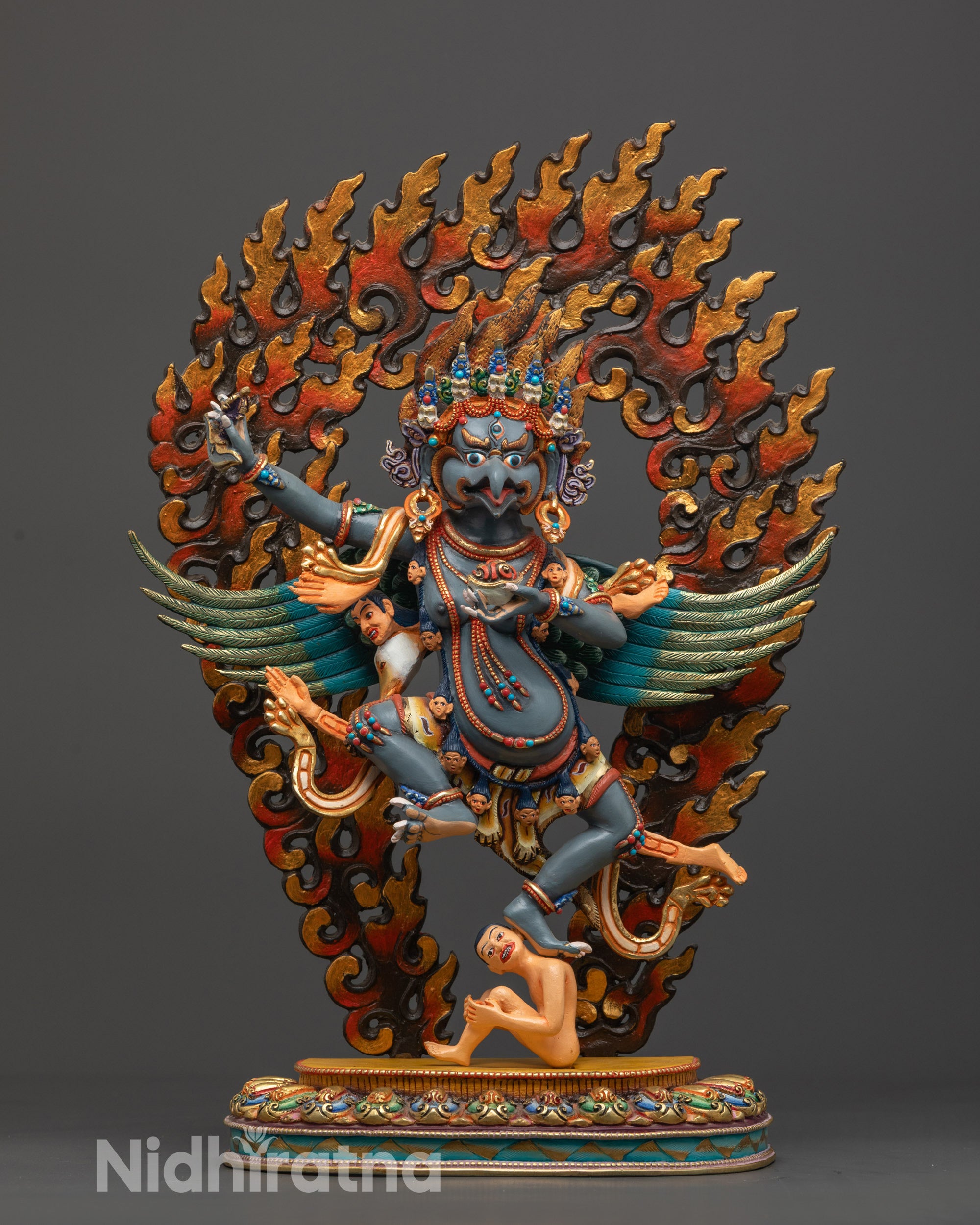 Front view Handcrafted Garuda Statue with copper base and vibrant colors
