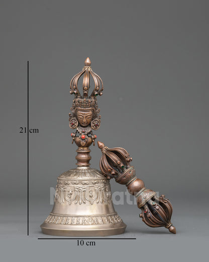 Front view Himalayan Ghanta and Dorje, bronze bell with oxidized copper handle and carved deity