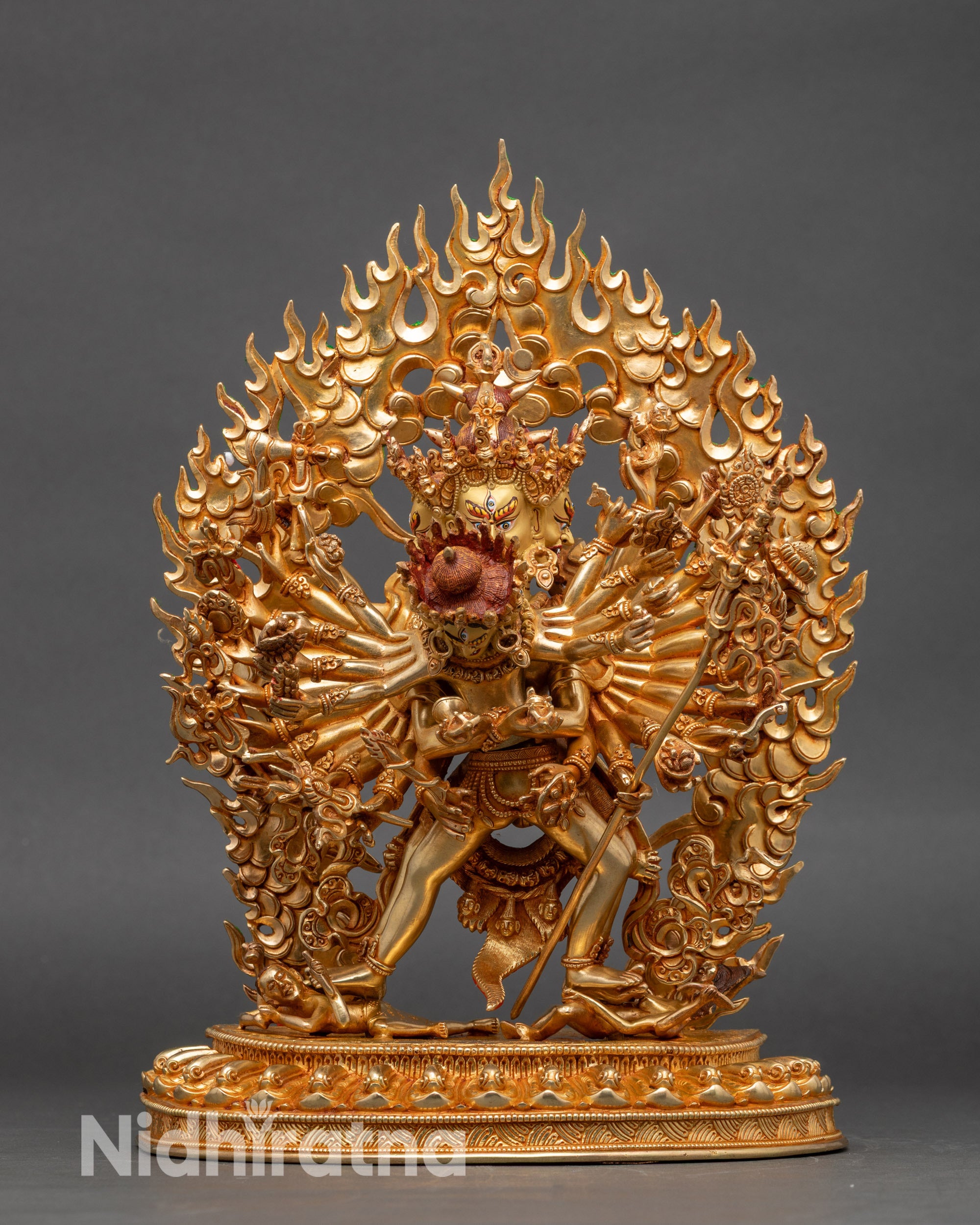 Front view Kalachakra statue gold-gilded copper four faces twenty-four arms Nepal