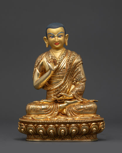 Front view Khedrup Je disciple statue holding scriptures in Vitarka Mudra