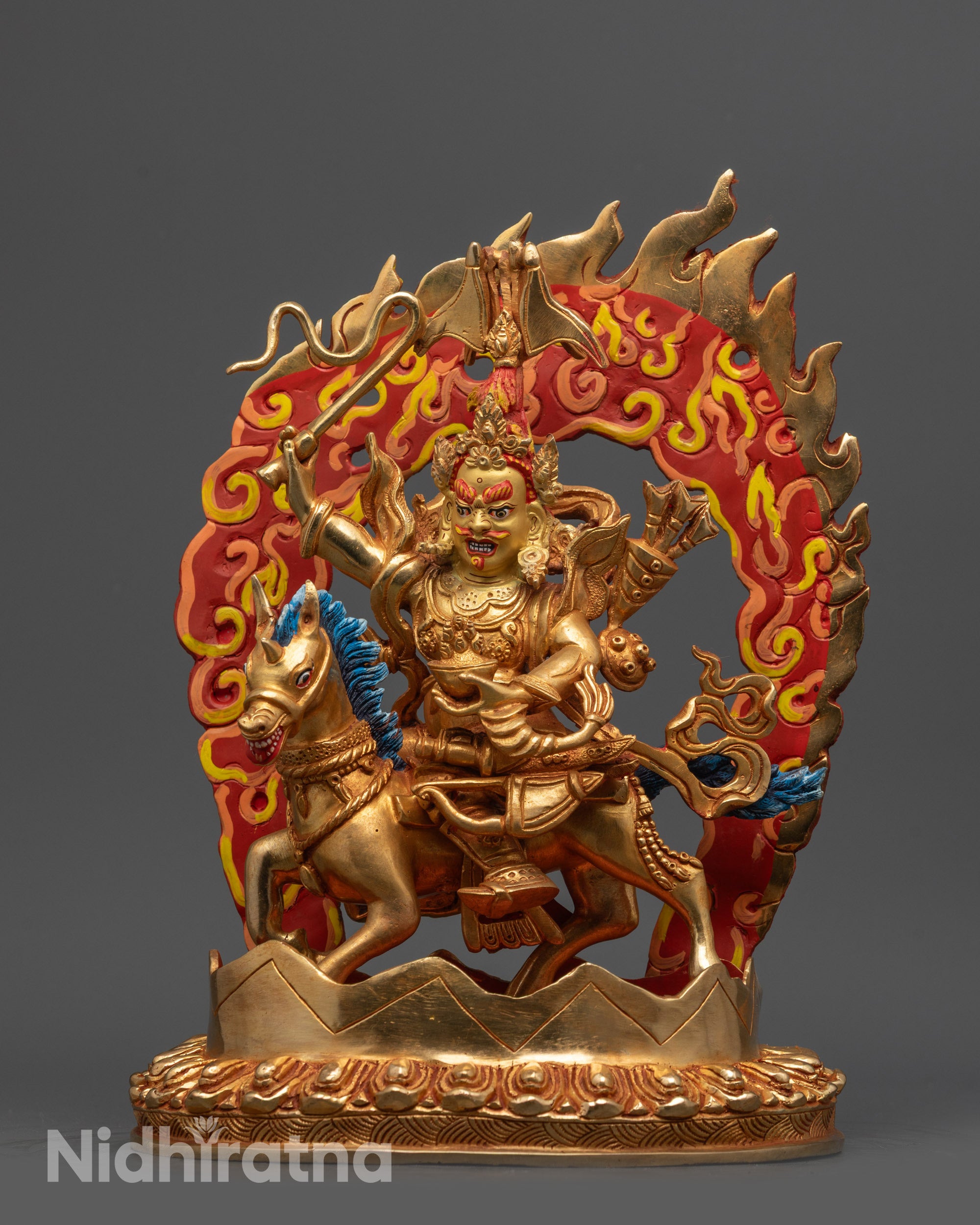 Front view King Gesar Statue on lotus base with gold-gilded face and armor

