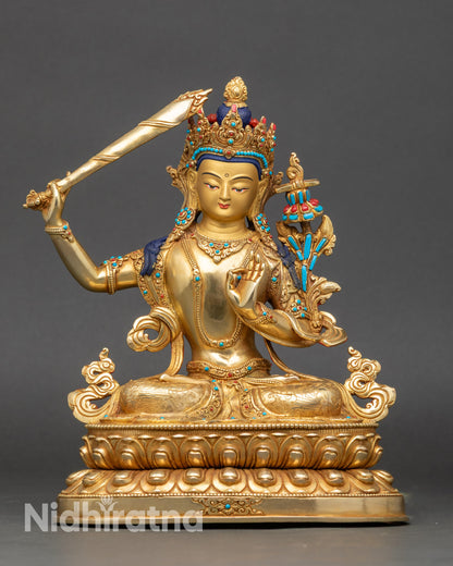 Front view Manjushree statue, copper with 24K gold and lotus pedestal details