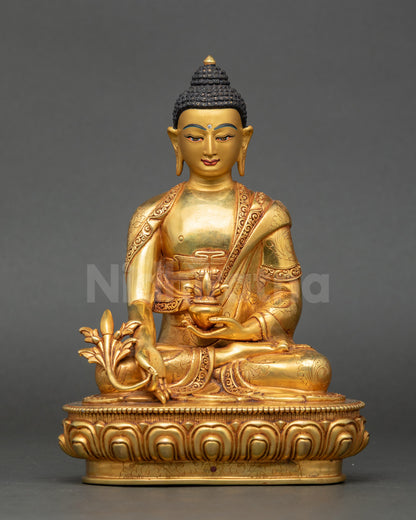 Front view Medicine Buddha statue gold-gilded copper seated meditative posture Nepalese art