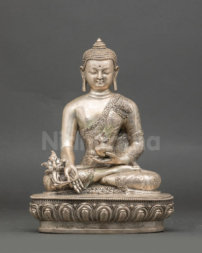 Front view Medicine Buddha statue, silver-plated Nepalese meditation sculpture