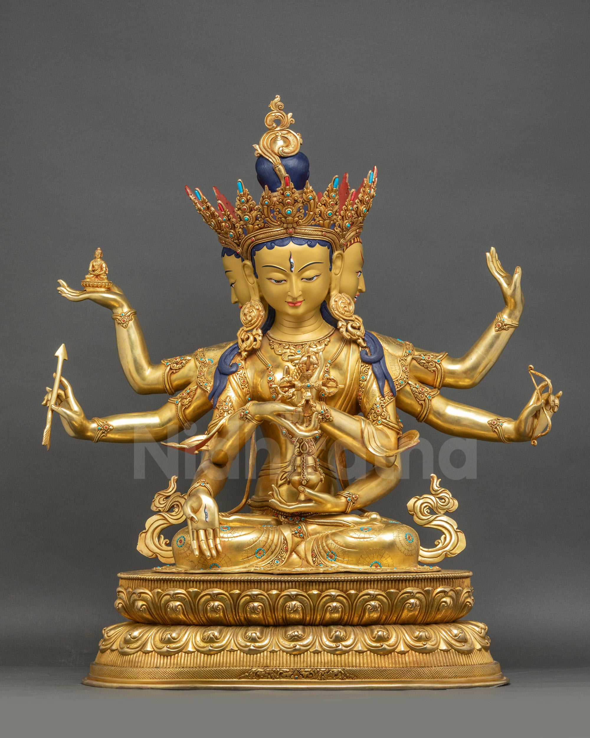 Front view Namgyalma statue with three gold-gilded faces on copper alloy lotus seat