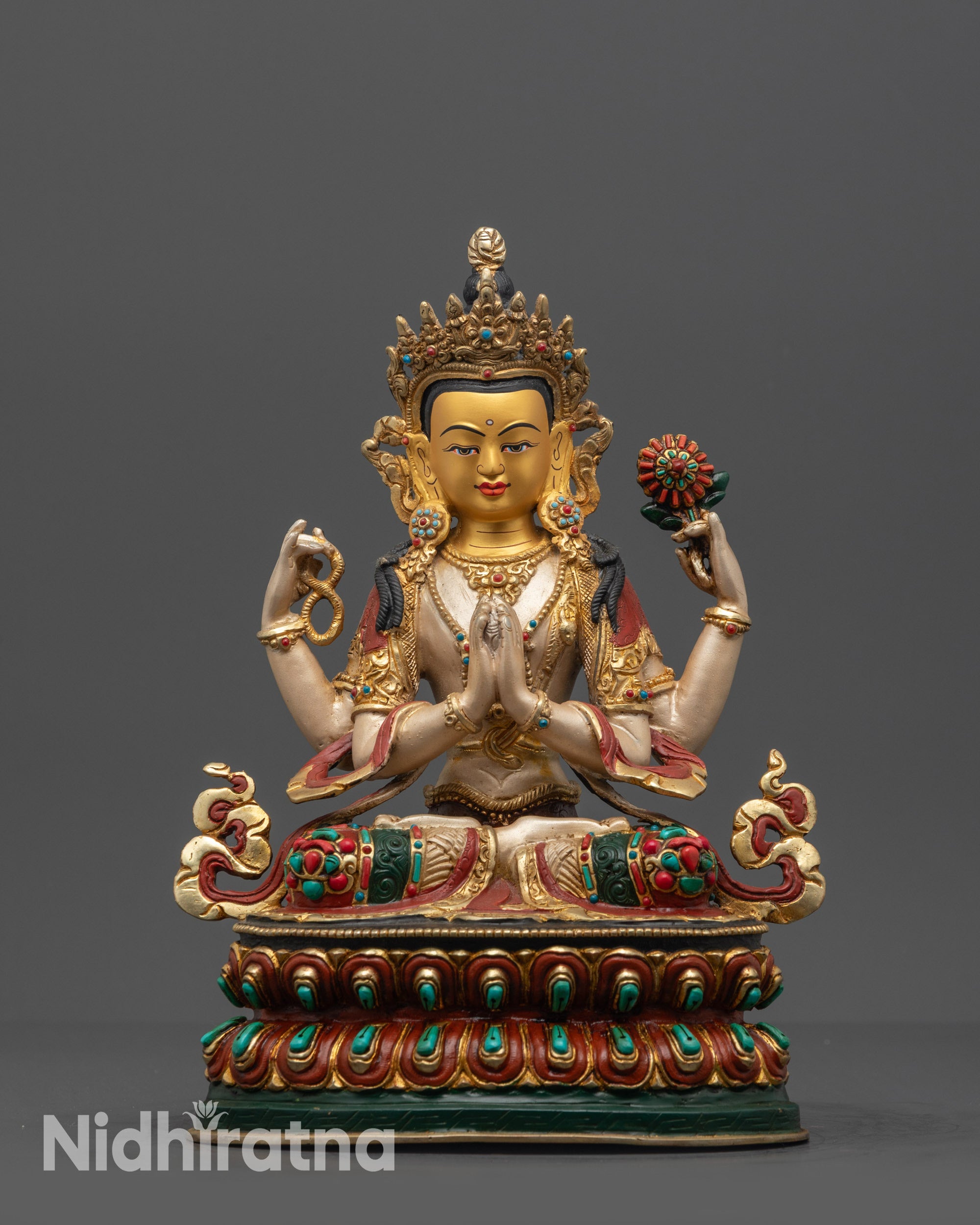 Front view Nepalese Chenrezig Statue with gold-gilded face and floating robe
