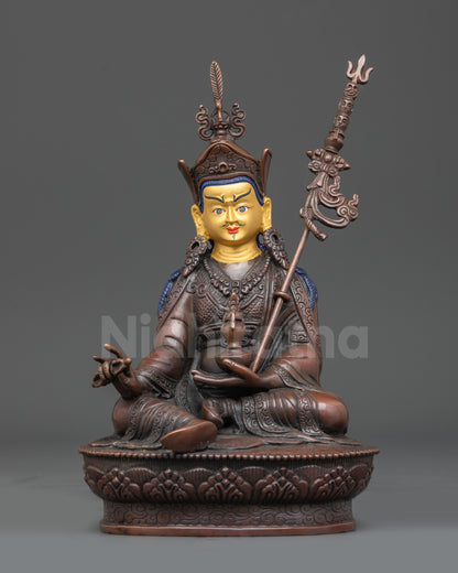 Front view Nepalese Guru Rinpoche statue with lotus seat and gold-gilded face