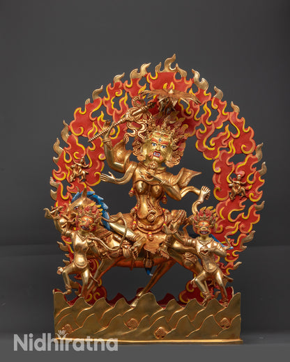 Front view Palden Lhamo statue with gold fire-gilded body and flowing robe