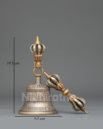 Front view Sacred Himalayan Vajra & Bell | Bronze bell with copper handle and carved deity