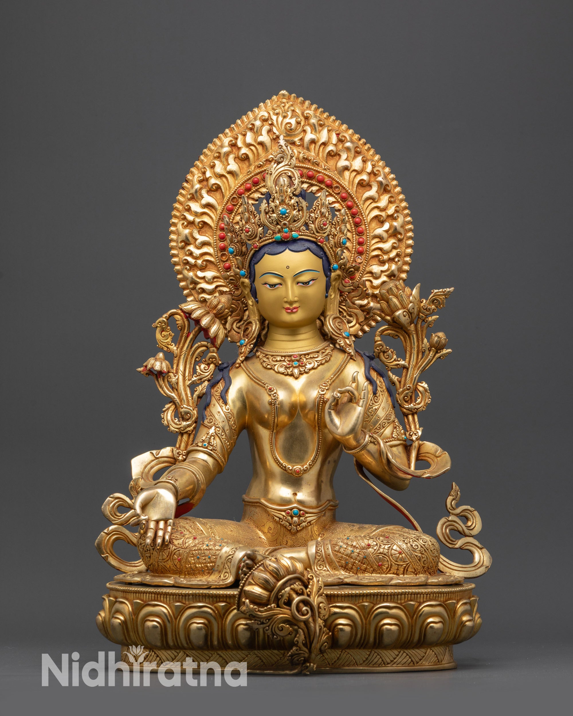Front view Serene Green Tara Statue with 24K gold-gilded face seated on lotus pedestal
