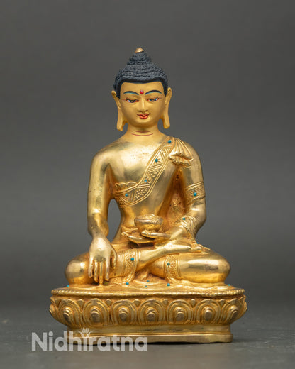 Front view – Shakyamuni Buddha Statue on lotus pedestal with gold detailing, meditation décor