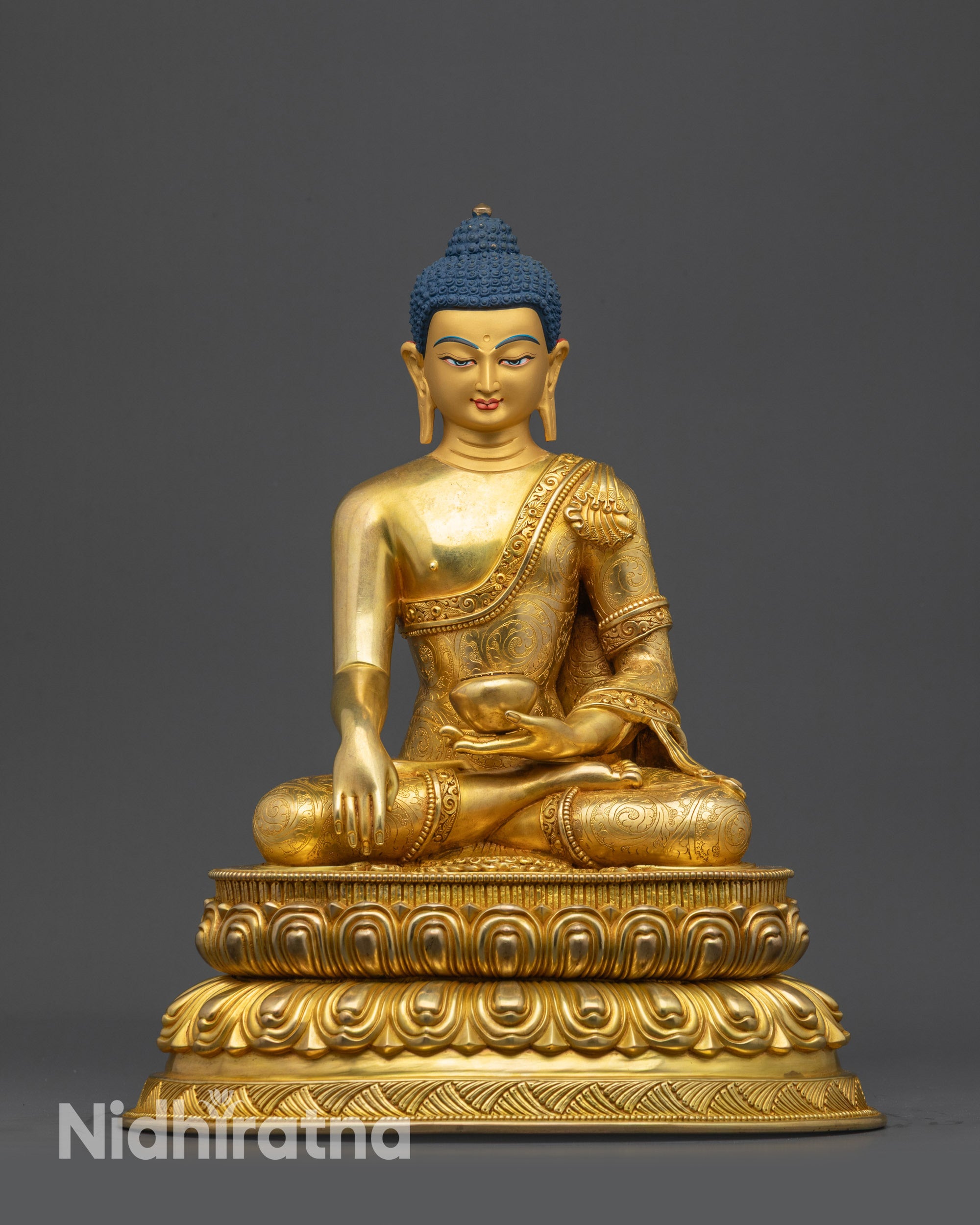 Front view Shakyamuni Buddha Statue with gold-gilded face and lotus pose