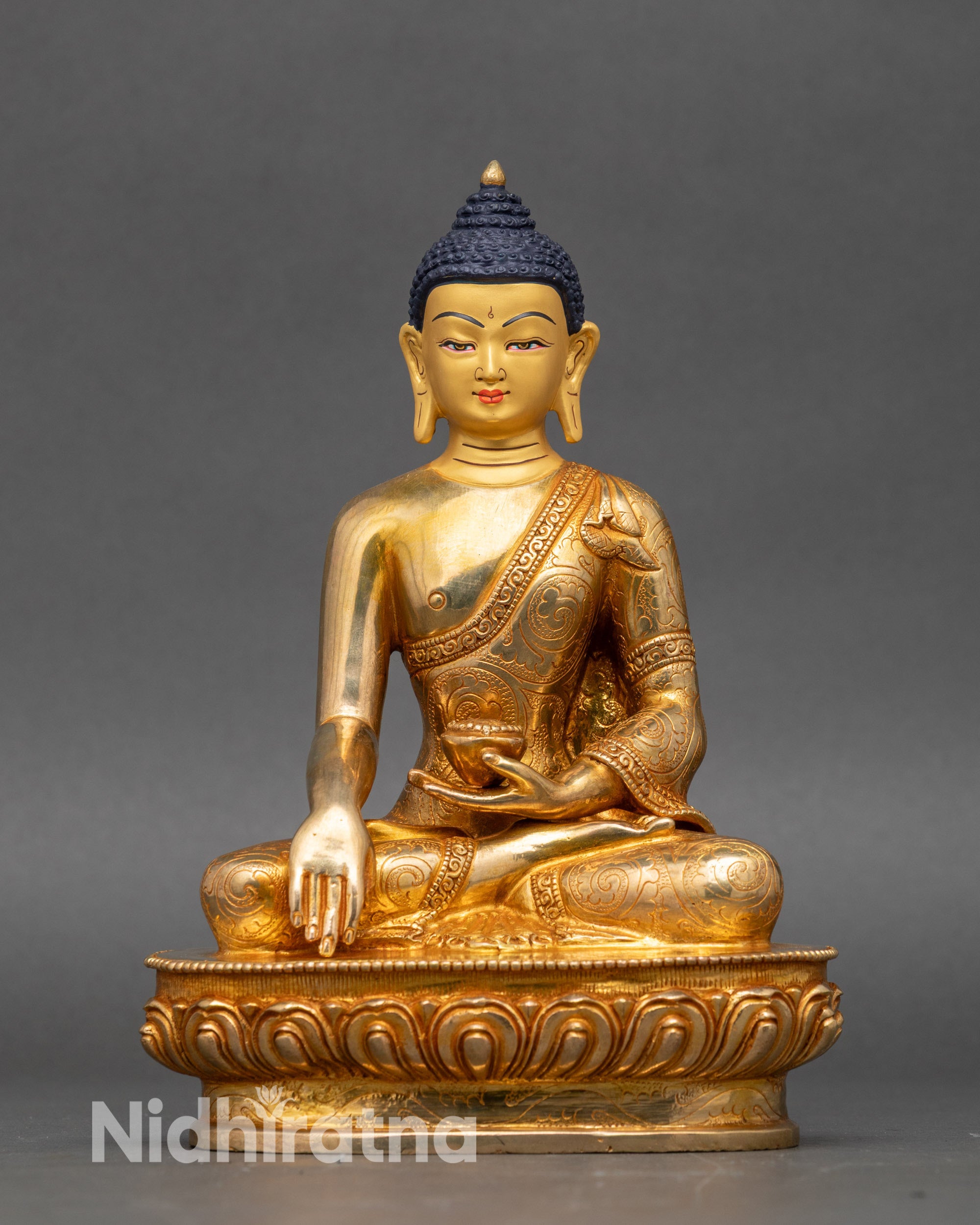 Front view Shakyamuni Buddha – gold gilded copper with lotus pedestal and 3D carvings