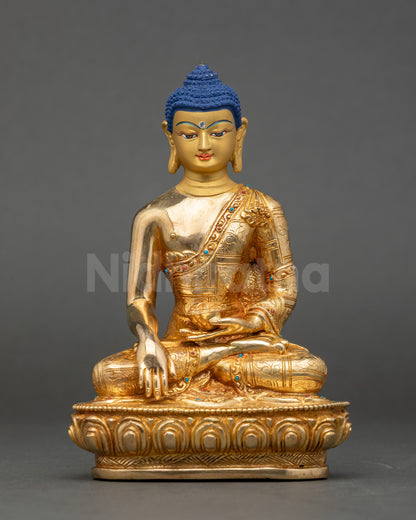 Front view Shakyamuni Buddha statue gold-detailed copper with Bhumisparsha mudra