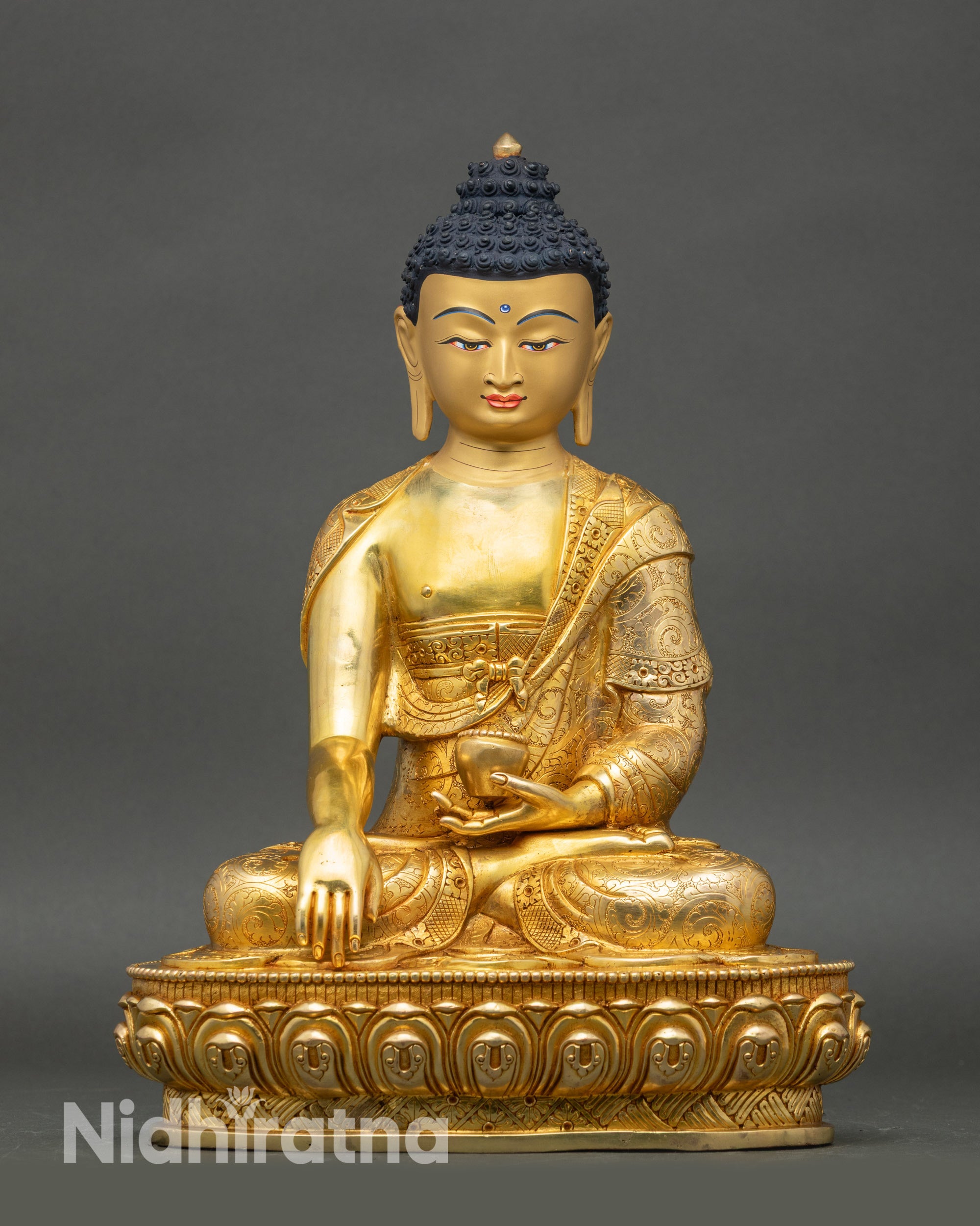 Front view Shakyamuni Buddha statue gold-gilded copper seated on lotus base meditation