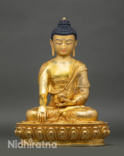 Front view Shakyamuni Buddha statue gold-gilded copper seated on lotus base meditation