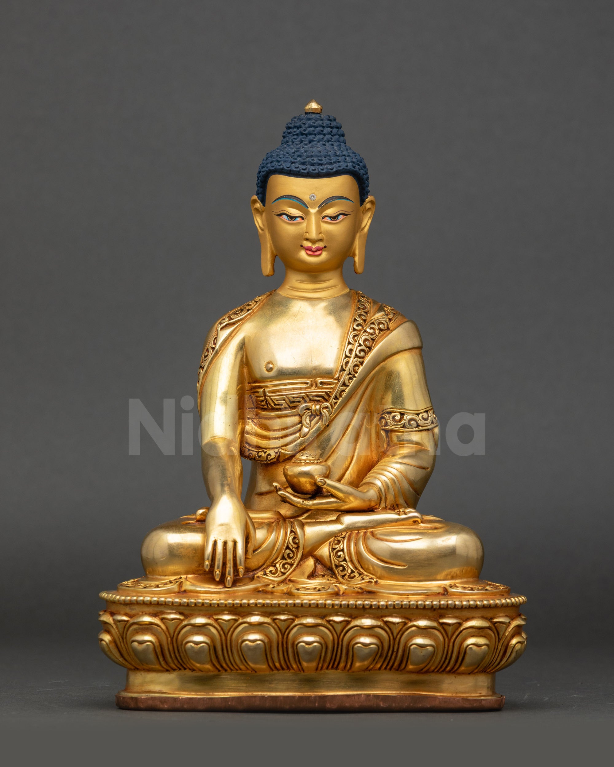 Front view Shakyamuni Buddha statue gold-gilded with Bhumisparsha mudra, Nepalese art